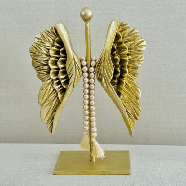 Alas con pedestal en color dorado